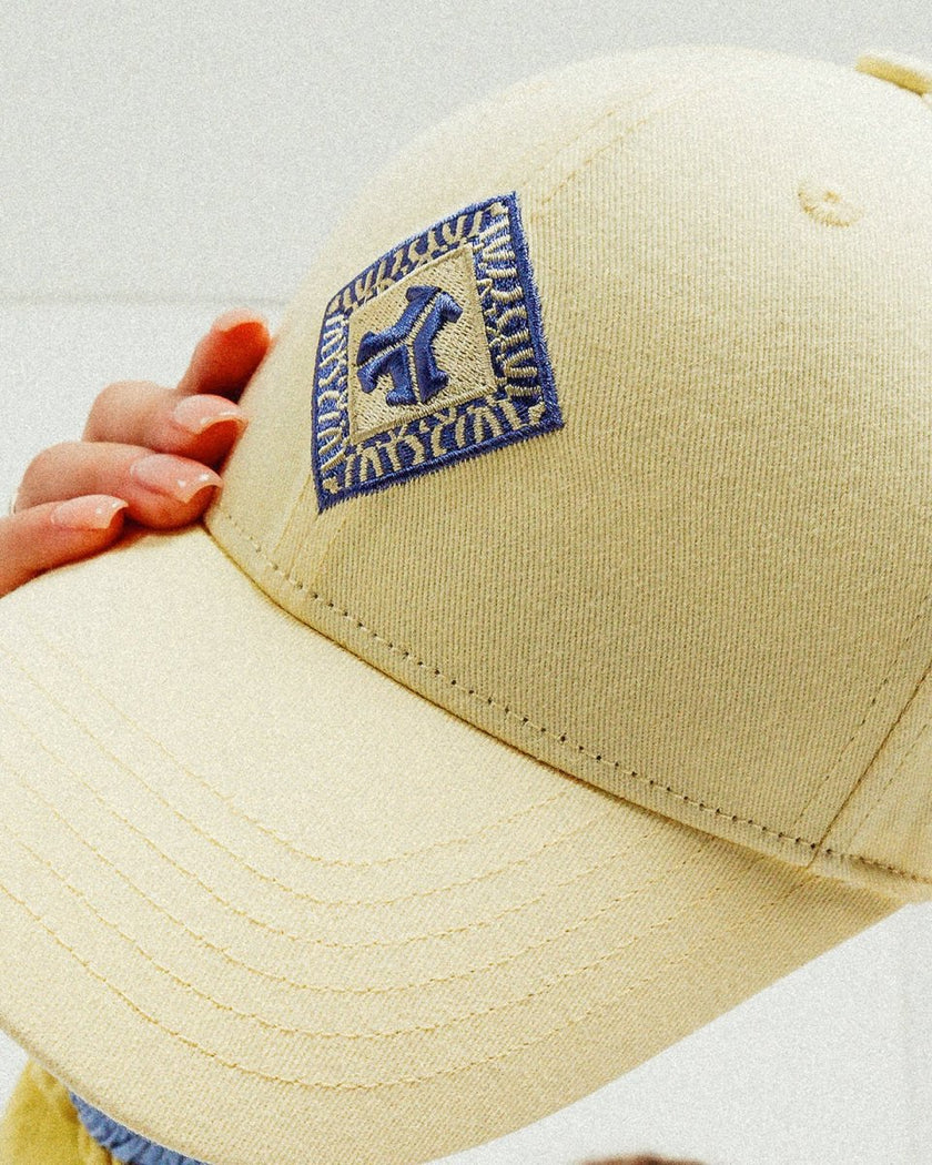 218. Baseball cap butter yellow - Defqon.1 Festival Store