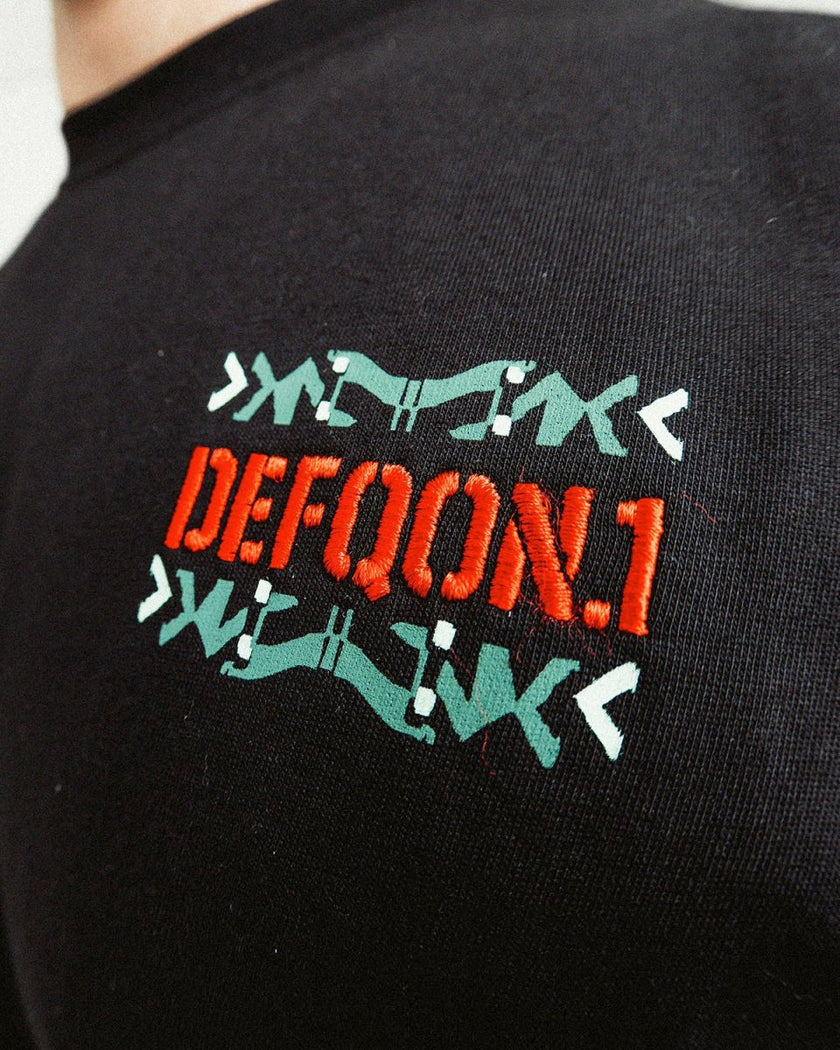 006. T-shirt Collecidoscope Black loose fit - Defqon.1 Festival Store